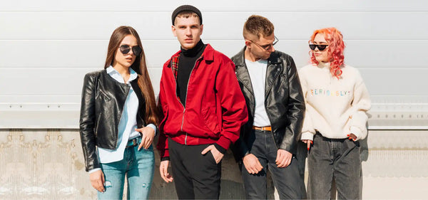 Four stylishly dressed young adults.